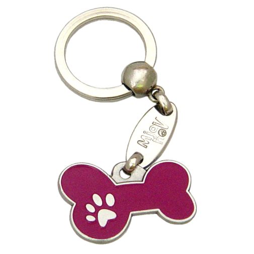 Custom personalized dog name tag Bone mjavhov purple

This unique, cute and quality dog id tag is offered with laser engraved name and phone no. or your custom text. Stainless steel split ring for easy attachment to your pets collar. All items are also available as keychains.
Gift for dogs and dog lovers.

Color: colored/silver
Size: 34 x 21 mm

Engraving area: 27 x 7 mm
Laser engraving personalization on the back side is included in the price. Enter the text you wish to have engraved. Suggestion: dog's name and phone number. We engrave on the back side of the tag. Engraving will be centered and easy to read. If you go over the recommended count then the text becomes smaller, and harder to read.

Metal, chrome plated dog tag or key ring. 
Hand made, hand colored, made in Slovenia. 

In stock.
