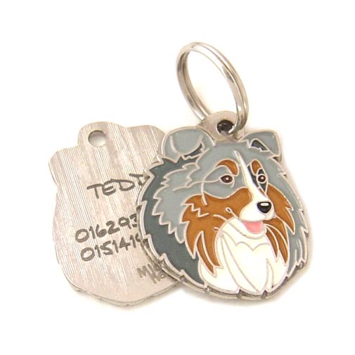 Custom personalized dog name tag Shetland sheepdog blue merle

This unique, cute and quality dog id tag is offered with laser engraved name and phone no. or your custom text. Stainless steel split ring for easy attachment to your pets collar. All items are also available as keychains.
Gift for dogs and dog lovers.

Color: colored/silver
Size: 28 x 33 mm

Engraving area: 21 x 20 mm
Laser engraving personalization on the back side is included in the price. Enter the text you wish to have engraved. Suggestion: dog's name and phone number. We engrave on the back side of the tag. Engraving will be centered and easy to read. If you go over the recommended count then the text becomes smaller, and harder to read.

Metal, chrome plated dog tag or key ring. 
Hand made, hand colored, made in Slovenia. 

In stock.
