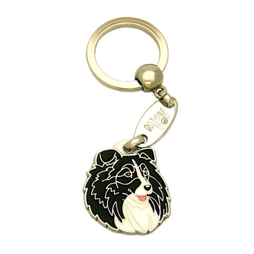 Custom personalized dog name tag Shetland sheepdog black and white

This unique, cute and quality dog id tag is offered with laser engraved name and phone no. or your custom text. Stainless steel split ring for easy attachment to your pets collar. All items are also available as keychains.
Gift for dogs and dog lovers.

Color: colored/silver
Size: 28 x 33 mm

Engraving area: 21 x 20 mm
Laser engraving personalization on the back side is included in the price. Enter the text you wish to have engraved. Suggestion: dog's name and phone number. We engrave on the back side of the tag. Engraving will be centered and easy to read. If you go over the recommended count then the text becomes smaller, and harder to read.

Metal, chrome plated dog tag or key ring. 
Hand made, hand colored, made in Slovenia. 

In stock.
