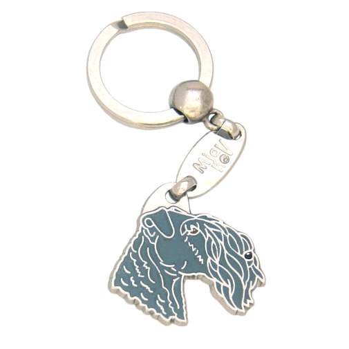 <h3>Custom personalized dog name tag Kerry blue terrier</h3>
This unique, cute and quality dog id tag is offered with laser-engraved name and phone number or your custom text. It comes with a stainless steel split ring for easy attachment to your pet’s collar. All items are also available as keychains.
A perfect gift for dogs and dog lovers.

<strong>Color:</strong> colored/silver
<strong>Size:</strong> 32 x 32 mm (1.26 x 1.26 inch)
<strong>Engraving area:</strong> 18 x 10 mm (0.71 x 0.39 inch); recommended layout up to 4 lines, 15 characters per line.

Laser engraving on the back side is included in the price. Please enter the text you would like engraved (recommended: dog’s name and phone number). The engraving will be centered and easy to read. 
<strong>Important:</strong> If you exceed the recommended text length, the engraving will be significantly smaller and may become difficult to read. For best readability, we strongly recommend keeping the text short and clear.

Metal, chrome plated dog tag or key ring. 
Hand made, hand colored, made in Slovenia. 

In stock.

<h3>About the breed – Kerry blue terrier</h3>
<section>
<h2>Kerry Blue Terrier: Characteristics & Care</h2>
<p><strong>Kerry Blue Terrier</strong> (Kerry Blue Terrier dog) is a medium-sized, energetic, and intelligent dog breed originating from Ireland. It belongs to the <strong>FCI Group 3 (Terriers)</strong>. It was bred as a <strong>working dog for hunting, guarding, and vermin control</strong>, recognizable for its soft, wavy blue-gray coat and elegant build.</p>
<h3>Temperament and Family Life</h3>
<p>Kerry Blue Terriers are loyal, lively, and strongly attached to their family, making them excellent family dogs that get along well with children. They are <strong>alert, brave, and intelligent</strong>, which makes them good watchdogs while maintaining a playful and sociable character. Their strong personality requires consistent training and early socialization.</p>
<h3>Physical Requirements & Exercise</h3>
<p>To live a healthy and happy life, a Kerry Blue Terrier needs:</p>
<ul>
    <li><strong>Daily Exercise:</strong> Plenty of activity, play, and regular walks.</li>
    <li><strong>Environment:</strong> Suitable for a house or apartment with enough activity.</li>
    <li><strong>Grooming:</strong> Regular trimming and brushing of the soft <strong>wavy coat</strong>.</li>
</ul>
<p><strong>Pro Tip:</strong> A personalized engraved dog tag is an elegant accessory that highlights the refined look of the Kerry Blue Terrier while ensuring its safety.</p>
</section>
