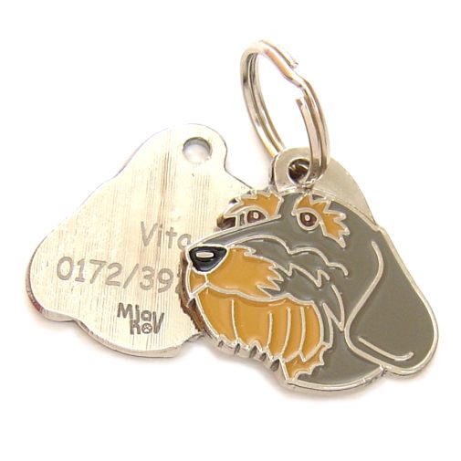 Custom personalized dog name tag Dachshund wire-haired

This unique, cute and quality dog id tag is offered with laser engraved name and phone no. or your custom text. Stainless steel split ring for easy attachment to your pets collar. All items are also available as keychains.
Gift for dogs and dog lovers.

Color: colored/silver
Size: 29 x 28 mm

Engraving area: 17 x 12 mm
Laser engraving personalization on the back side is included in the price. Enter the text you wish to have engraved. Suggestion: dog's name and phone number. We engrave on the back side of the tag. Engraving will be centered and easy to read. If you go over the recommended count then the text becomes smaller, and harder to read.

Metal, chrome plated dog tag or key ring. 
Hand made, hand colored, made in Slovenia. 

In stock.
