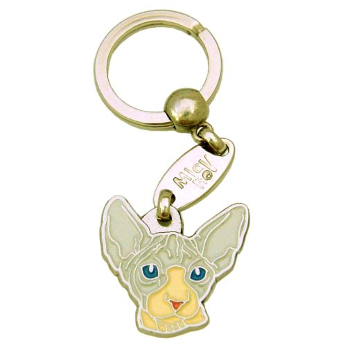 Custom personalized cat name tag Sphynx cat cinnamon cream

This unique, cute and quality cat id tag is offered with laser engraved name and phone no. or your custom text. Stainless steel split ring for easy attachment to your pets collar. All items are also available as keychains.
Gift for cats and cat lovers.

Color: colored/silver
Size: 30 x 31 mm

Engraving area: 18 x 12 mm
Laser engraving personalization on the back side is included in the price. Enter the text you wish to have engraved. Suggestion: cat's name and phone number. We engrave on the back side of the tag. Engraving will be centered and easy to read. If you go over the recommended count then the text becomes smaller, and harder to read.

Metal, chrome plated cat tag or key ring. 
Hand made, hand colored, made in Slovenia. 

In stock.
