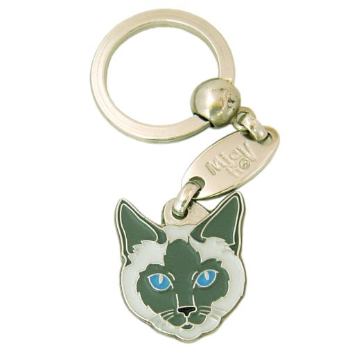 Custom personalized cat name tag Siamese cat traditional blue

This unique, cute and quality cat id tag is offered with laser engraved name and phone no. or your custom text. Stainless steel split ring for easy attachment to your pets collar. All items are also available as keychains.
Gift for cats and cat lovers.

Color: colored/silver
Size: 24 x 28 mm

Engraving area: 20 x 15 mm
Laser engraving personalization on the back side is included in the price. Enter the text you wish to have engraved. Suggestion: cat's name and phone number. We engrave on the back side of the tag. Engraving will be centered and easy to read. If you go over the recommended count then the text becomes smaller, and harder to read.

Metal, chrome plated cat tag or key ring. 
Hand made, hand colored, made in Slovenia. 

In stock.
