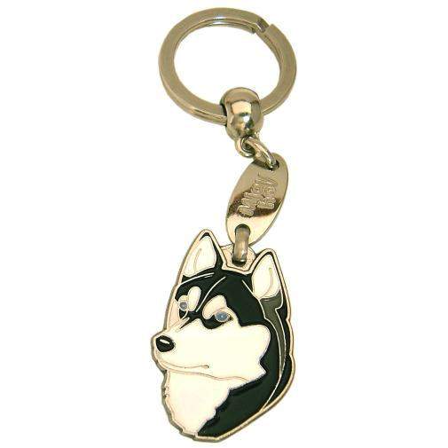 Custom personalized dog name tag Siberian husky black and white

This unique, cute and quality dog id tag is offered with laser engraved name and phone no. or your custom text. Stainless steel split ring for easy attachment to your pets collar. All items are also available as keychains.
Gift for dogs and dog lovers.

Color: colored/silver
Size: 26 x 36 mm

Engraving area: 18 x 22 mm
Laser engraving personalization on the back side is included in the price. Enter the text you wish to have engraved. Suggestion: dog's name and phone number. We engrave on the back side of the tag. Engraving will be centered and easy to read. If you go over the recommended count then the text becomes smaller, and harder to read.

Metal, chrome plated dog tag or key ring. 
Hand made, hand colored, made in Slovenia. 

In stock.
