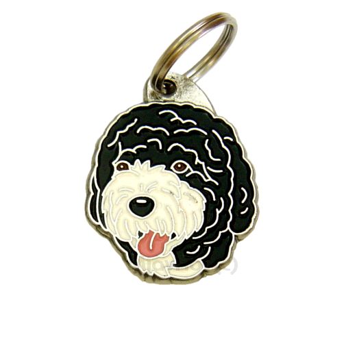 Custom personalized dog name tag Portuguese water dog black and white

This unique, cute and quality dog id tag is offered with laser engraved name and phone no. or your custom text. Stainless steel split ring for easy attachment to your pets collar. All items are also available as keychains.
Gift for dogs and dog lovers.

Color: colored/silver
Size: 27 x 34 mm

Engraving area: 21 x 15 mm
Laser engraving personalization on the back side is included in the price. Enter the text you wish to have engraved. Suggestion: dog's name and phone number. We engrave on the back side of the tag. Engraving will be centered and easy to read. If you go over the recommended count then the text becomes smaller, and harder to read.

Metal, chrome plated dog tag or key ring. 
Hand made, hand colored, made in Slovenia. 

In stock.
