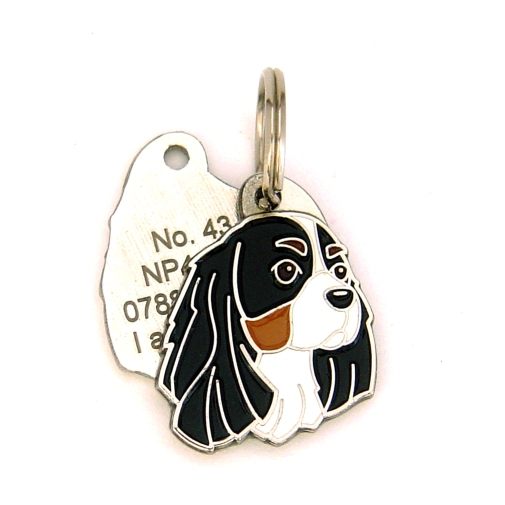 Custom personalized dog name tag Cavalier king charles spaniel tricolor

This unique, cute and quality dog id tag is offered with laser engraved name and phone no. or your custom text. Stainless steel split ring for easy attachment to your pets collar. All items are also available as keychains.
Gift for dogs and dog lovers.

Color: colored/silver
Size: 24 x 33 mm

Engraving area: 18 x 17 mm
Laser engraving personalization on the back side is included in the price. Enter the text you wish to have engraved. Suggestion: dog's name and phone number. We engrave on the back side of the tag. Engraving will be centered and easy to read. If you go over the recommended count then the text becomes smaller, and harder to read.

Metal, chrome plated dog tag or key ring. 
Hand made, hand colored, made in Slovenia. 

In stock.
